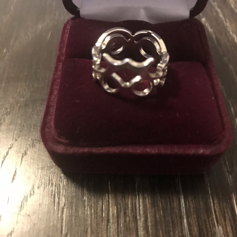 Free people Silver ring. Design all around.